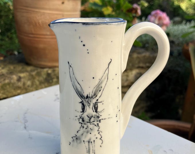 Handmade cream coloured ceramic milk jug : hand painted hare design