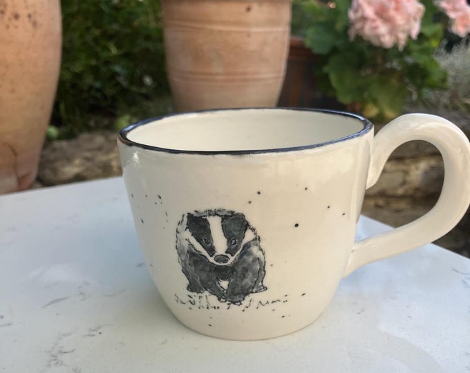 Handmade hand painted white ceramic coffee cup with hand painted badger design free U.K. delivery
