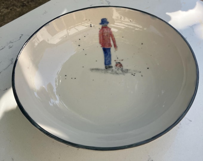 Handmade ceramic cream coloured bowl with hand painted ‘lady and her dog’ design for food, snacks or decorative item. Free U.K. delivery.