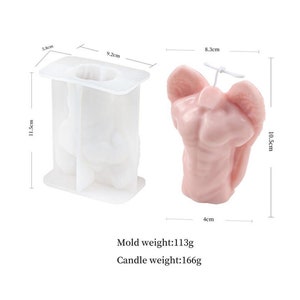 May include: A white silicone mold and a pink candle in the shape of a torso with wings. The mold is 9.2 cm wide, 11.5 cm tall, and 5.8 cm deep. The candle is 8.3 cm wide, 10.5 cm tall, and 4 cm deep. Mold weight: 113g. Candle weight: 166g.