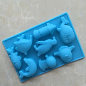 1 molde de silicona ecológico The Sea World con forma de delfín y pez, molde de silicona para chocolate, molde de silicona para jabón hecho a mano, molde para mousse y gelatina