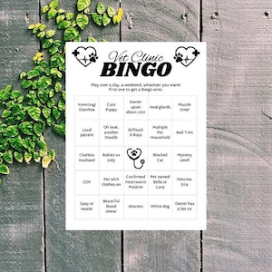 May include: A black and white bingo card with the title "Vet Clinic Bingo". The card has squares with various reasons a pet owner might visit a veterinarian, such as "Cute Puppy", "Owner upset about cost", "Anal glands", "Muzzle time", "Loud patient", "Oh look, another Doodle", "Difficult X-Rays", "Multiple Pet Household", "Nail Trim", "Clueless Husband", "Rabies vx only", "Blocked Cat", "Mystery smell", "GDV", "Pet with clothes on", "Confirmed Heartworm Positive", "Pet named Bella or Luna", "Pancreatitis", "Spay or neuter", "Beautiful blood smear", "Abscess", "White dog", "Owner has a hat on".