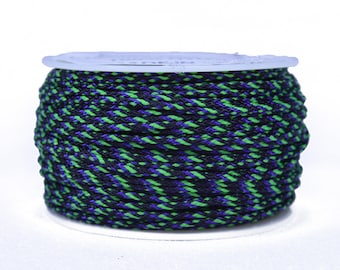 May include: A spool of black and green patterned cord.