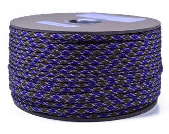May include: A spool of blue and brown paracord with a camouflage pattern. The paracord is wound tightly around the spool.