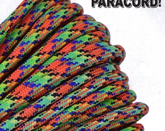 May include: A close-up of a multi-colored paracord rope with red, green, blue, black, and yellow stripes. The rope is coiled and the text "BORED? PARACORD!" is visible in the background.