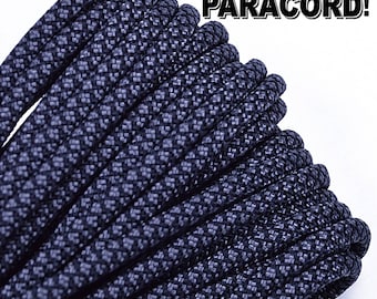 May include: Coiled black paracord rope with a textured pattern. The image includes the text "BORED? PARACORD!" in a bold, sans-serif font. The rope is tightly wound, showcasing its durability and construction.