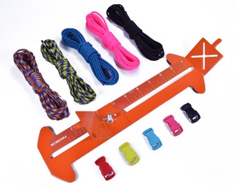 May include: A set of paracord crafting supplies, including five spools of paracord in various colors, four plastic buckles, and an orange paracord jig with a ruler and a cross-shaped guide.