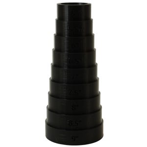Op de afbeelding: Een zwarte trapvormige pijpfitting met afmetingen van 12,7 cm tot 22,9 cm aan de zijkant. De fitting is gemaakt van een solide, donker materiaal en heeft een cilindrische vorm met variërende diameters.