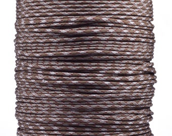 May include: A spool of brown and white camouflage paracord.