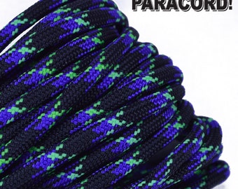 May include: A close-up of black paracord with purple and green stripes. The paracord is coiled and the text "BORED? PARACORD!" is visible in the upper right corner of the image.