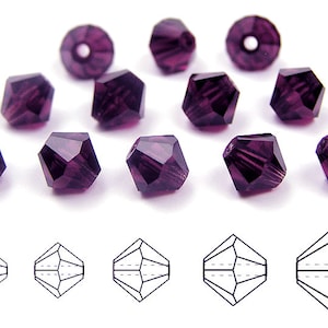 May include: Twelve amethyst-colored crystal beads, each with a faceted, hexagonal shape. The beads are arranged in two rows of six, with the top row slightly offset from the bottom row. Below the beads are five line drawings of the bead shape.