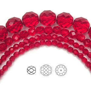 May include: A close-up of a strand of red faceted glass beads. The beads are arranged in a semi-circle, with the largest beads at the top and the smallest beads at the bottom. The beads are all faceted, giving them a sparkling appearance.