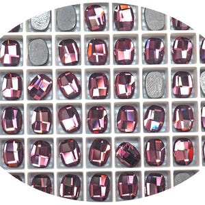 Swarovski Art.# 2585 - 12 Swarovski Graphic Oval Hotfix Cabochons in der Größe 10 mm Crystal Antik Pink beschichtet SW150