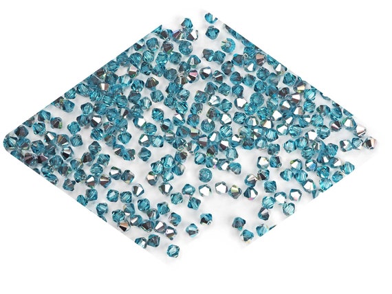 Turquoise (Preciosa color), Czech Glass Beads, Machine Cut Bicones (MC -  Crystals and Beads for Friends