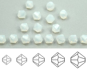 May include: A collection of 18 white opaque bicone beads. The beads are faceted and have a slightly iridescent finish. The beads are arranged in a triangular pattern on a white background. A diagram of the bead shape is shown below the beads.
