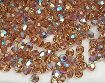 Swarovski Art.# 335 - 6 mm Topacio Colorado Claro AB 12 piezas de cuentas espaciadoras de aspirina con forma de lenteja de cristal aplastado vintage SW159