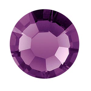 May include: A single, round, purple rhinestone with a faceted design.