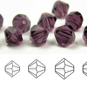 May include: A close-up of a group of amethyst-colored crystal beads. The beads are faceted and have a hole in the center for stringing. The beads are arranged in a random pattern on a white surface. A diagram of the bead shape is shown below the beads.