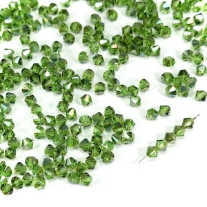 Peridot Celsian coated Czech Glass Beads Machine Cut Bicones MC Rondell Diamond Shape green crystals 4mm