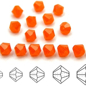 May include: Orange crystal beads, 4mm in size, with a faceted, cube-like shape. The beads are arranged in a triangular pattern and a line. A close-up of the bead shape is shown below.