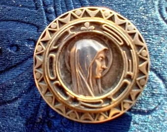 Virgin Mary brooch,  heavy sterling silver,  deep cut relief decoration