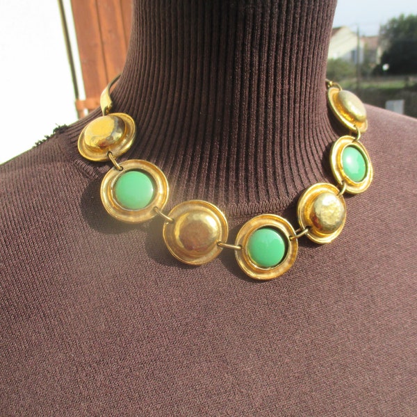 Heavy runway choker signed Rigaux France, gold tone with green glass cabs