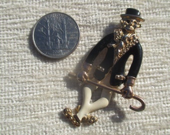 Dancing monkey clown, articulated brooch, gold tone enamelled metal