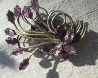 Mid century brooch clip combination, purple spray of rhinestones on silver tone metal with patina