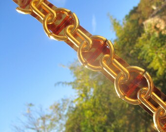 80s faux tortoise shell and gold tone belt, chunky runway metal and plastic 'chain' belt, 87 cm / 34.2" largest adjustment