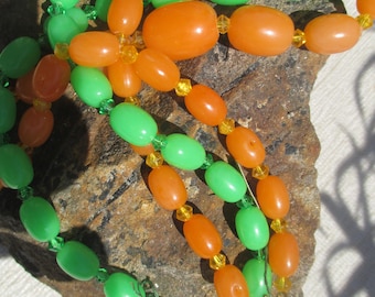 Pair of 70s plastic necklaces, new old stock
