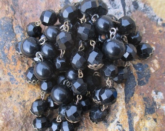 Mid century black dangle brooch, spray of French jet and lucite beads, nice size, lots of shine and movement
