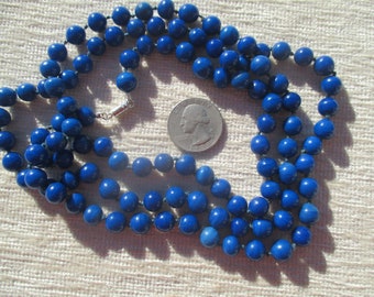 A long 60s glass bead necklace, hand knotted flapper bead style, adjustable with chrome color clasp