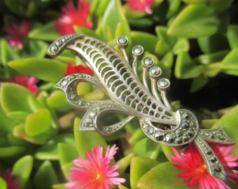 40s solid silver brooch with marcasite, hallmarked 800 stylized floral with openwork leaf