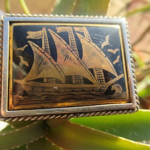 Gold on black enamel sailing boat  brooch, 1940s art deco sailing ship / galleon