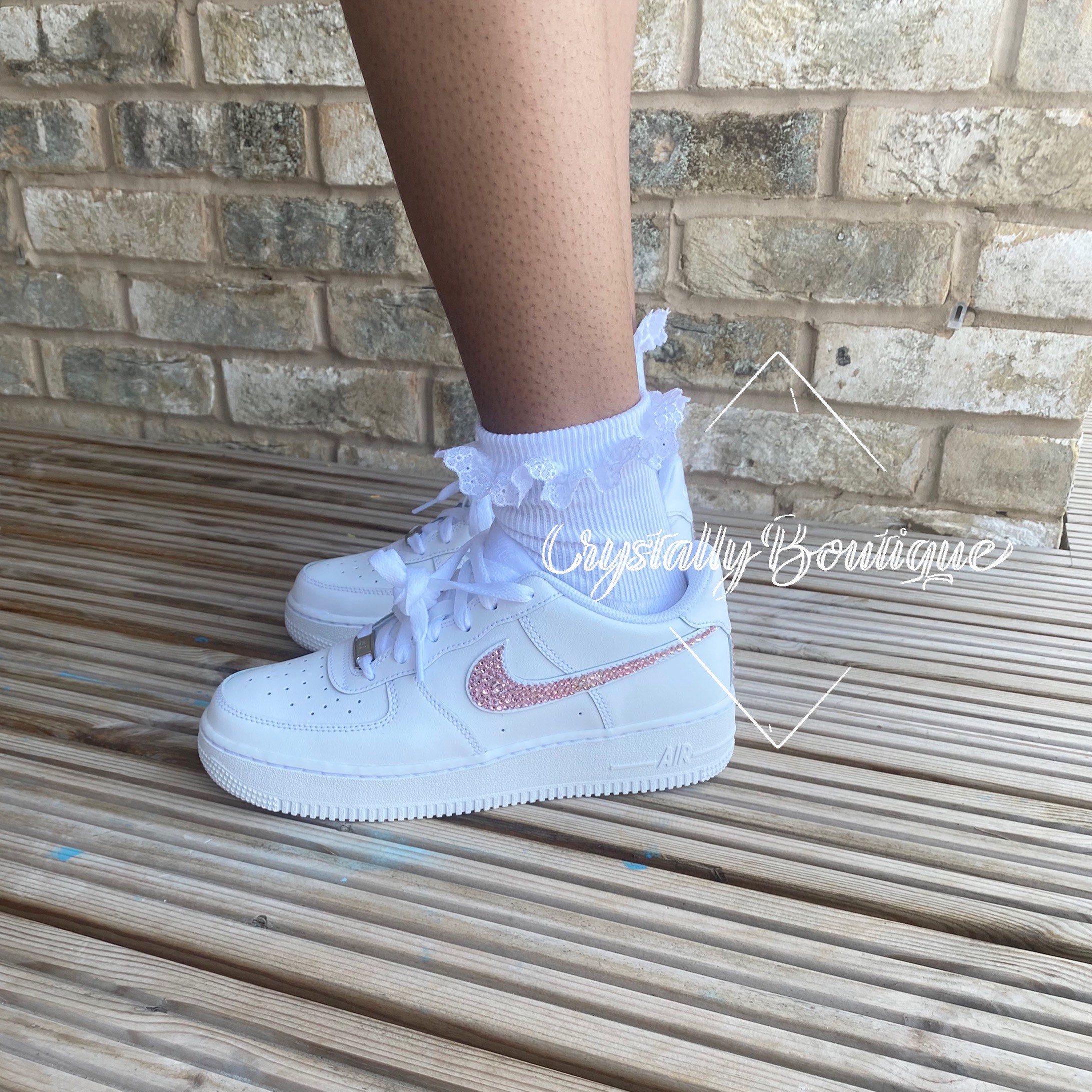 white & pink air force 1 trainers junior