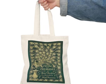 May include: A white canvas tote bag with a green and gold design featuring a peacock and the text "Pride and Prejudice by Jane Austen Illustrated by Hugh Thomson".