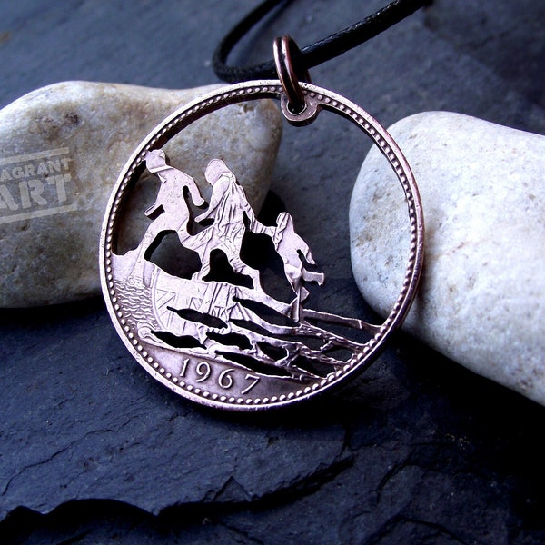 Refugees Welcome necklace, hand cut from a 1967 British penny coin.