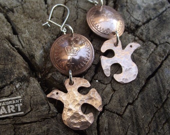 Recycled Coin earrings, hand made statement accessories with a dove cut from a bronze coin.