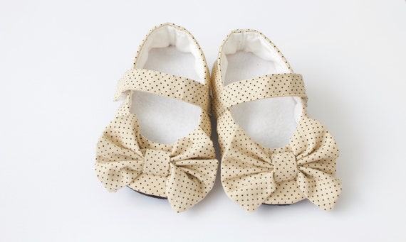 Mustard corduroy mary jane baby girls shoes with bow on strap.