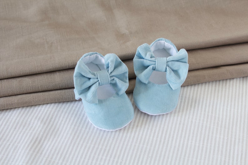 pale blue baby shoes