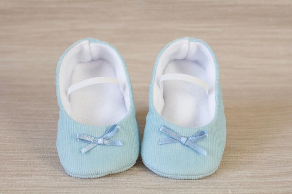 pale blue baby shoes