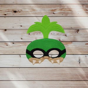 Geborduurd vilten schildpadmasker: aankleden voor kinderen