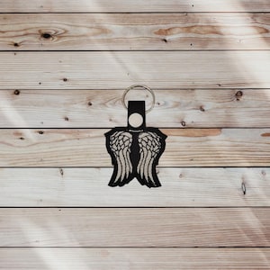 Daryl Wings Schlüsselanhänger - TBT Bestickter Schlüsselanhänger - Reißverschluss - Vinyl bestickter Schlüsselanhänger