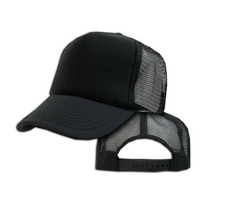 May include: A black trucker hat with a mesh back. The front of the hat is solid black, while the back is made of a black mesh material.