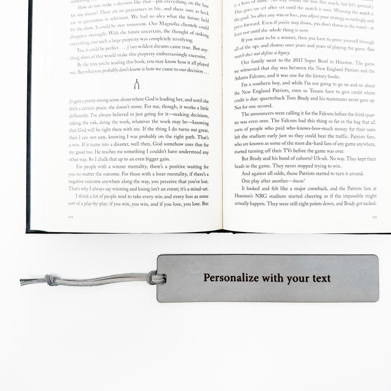a page from a book with text and a personalized bookmark with text on it.