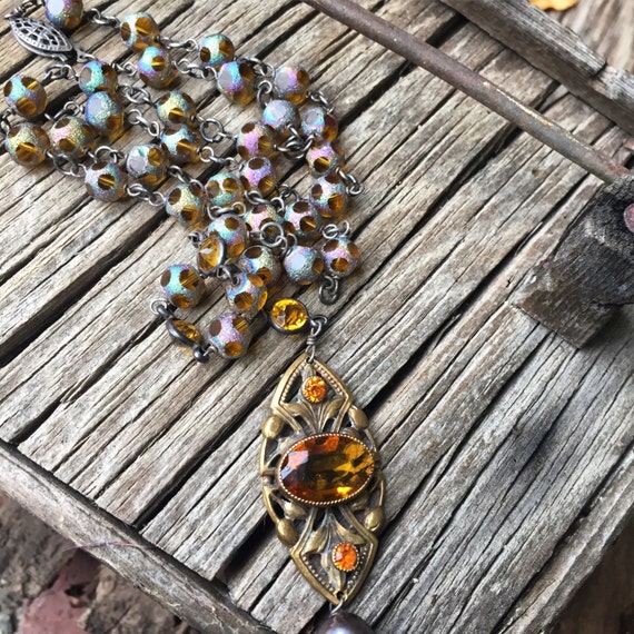 1930s amber cut glass and amber rainbow bead laval