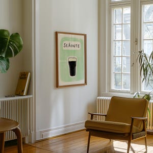 Framed Guinness wall art hand drawn illustrated guinness print with pint glass and slainte text above it. Ideal christmas gift for a guinness drinker