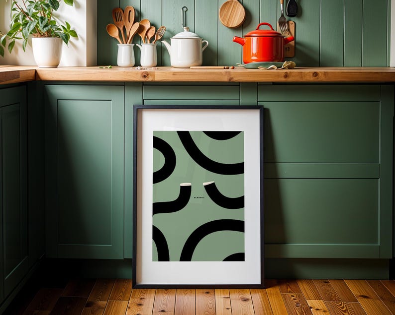 Guinness Print Slainte illustration poster featuring two iconic Guinness Glasses forming the "Split the G" shape on a sage green background with bold black curves and creamy foam tops. This Irish art wall print is perfect home décor for a Home Bar, man cave, or Dublin-inspired kitchen. It makes a thoughtful Christmas gift, a cute Christmas gift for a friend, and a perfect Valentine gift for him. Ideal for Guinness drinkers, Irish men, or anyone who loves iconic Irish artwork.