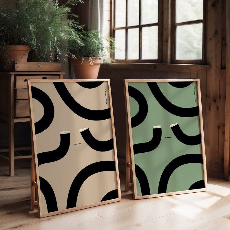 Two popular Guinness prints side by side one in biege and one in green. Abstract wiggly guinness pint glasses with cheers in the middle. Large kitchen bar style print art work. Original Guinness designs a gift for a guinness drinker at christmas