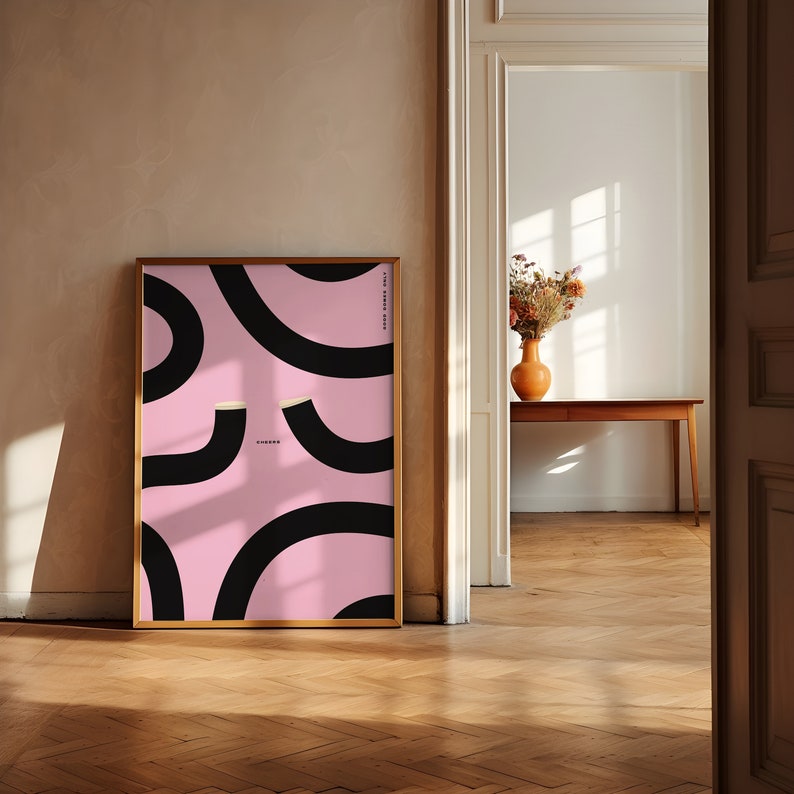 May include: A framed poster with a pink background and black curved lines. The poster has the word "CHORDS" printed in white on the bottom.